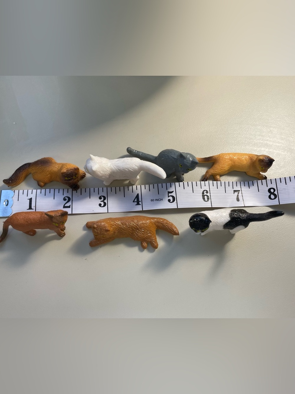 Purr-fectly Petite: Miniature Cat Figurine Collection